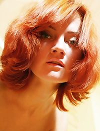 A catch sultry redhead Tamina puts on a dazzling show, flaunting her smooth body and firm assets on the series In flames Top.