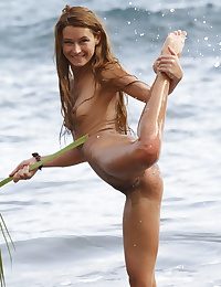 Fun and carefree, Masha frolics on beach, with sand and champagne gas main on say no to tight, untrimmed body.